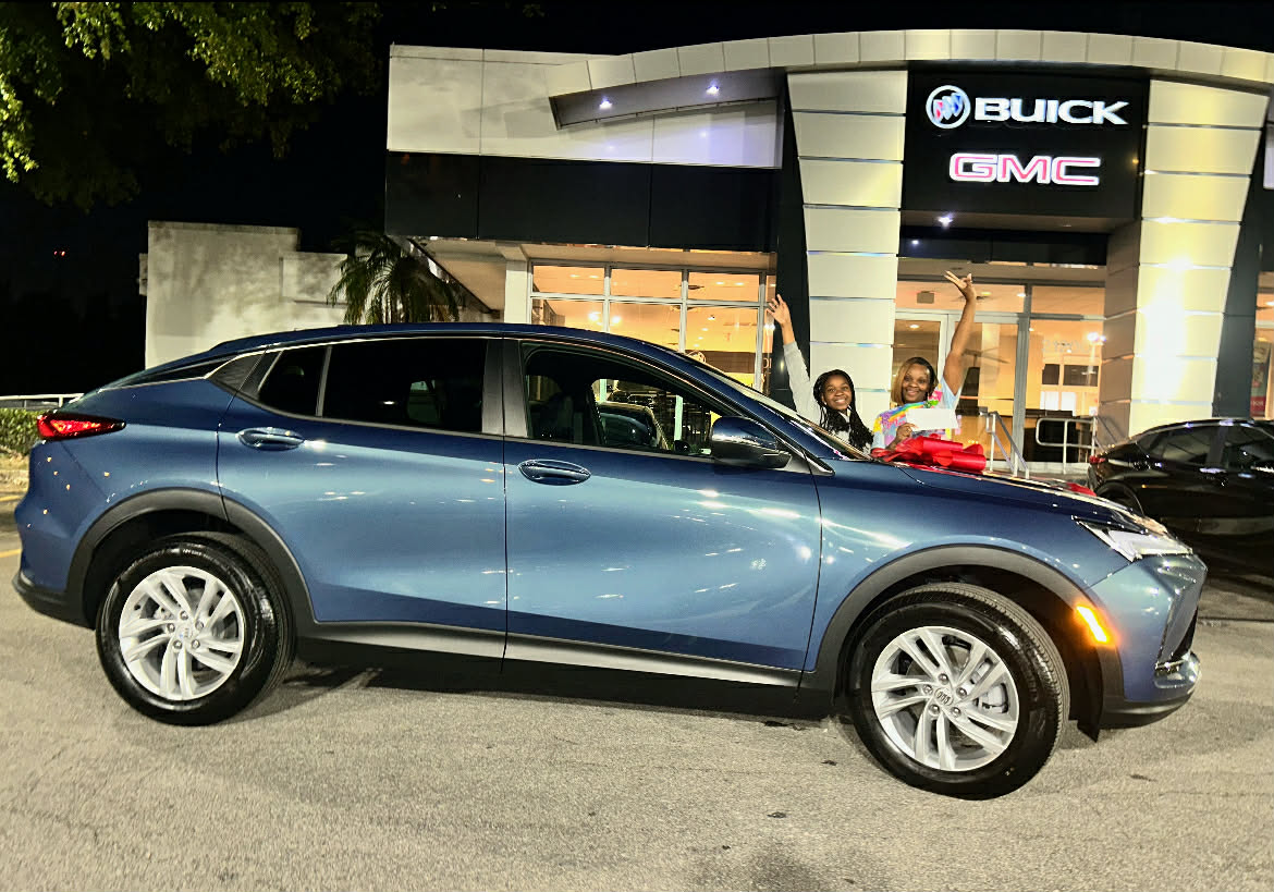 Client celebrating new Buick SUV